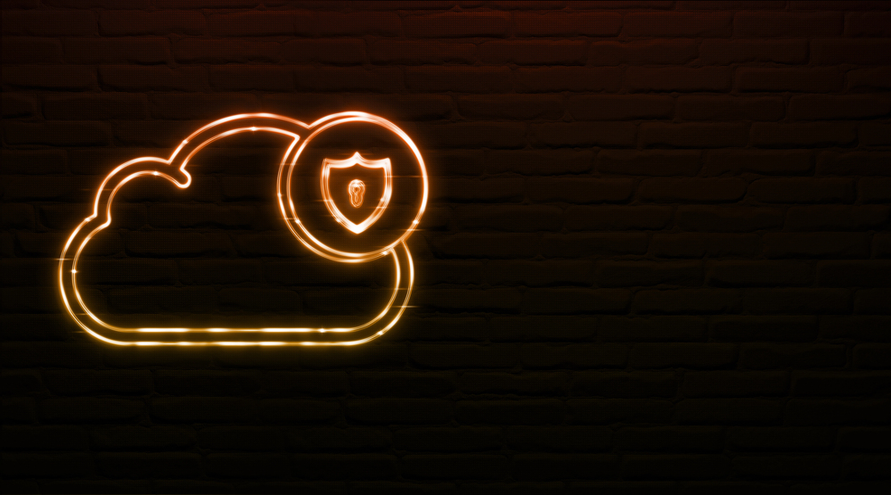 A glowing cloud and shield explaining cybersecurity as part of a cmmc compliance checklist.